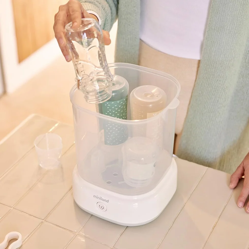 Miniland - Mini Steamy Sterilizzatore Vapore Bianco Grande Capacità, Sterilizzazione Naturale Senza Prodotti Chimici, Lavabile in Lavastoviglie, Segnale Visivo e Spegnimento Automatico
