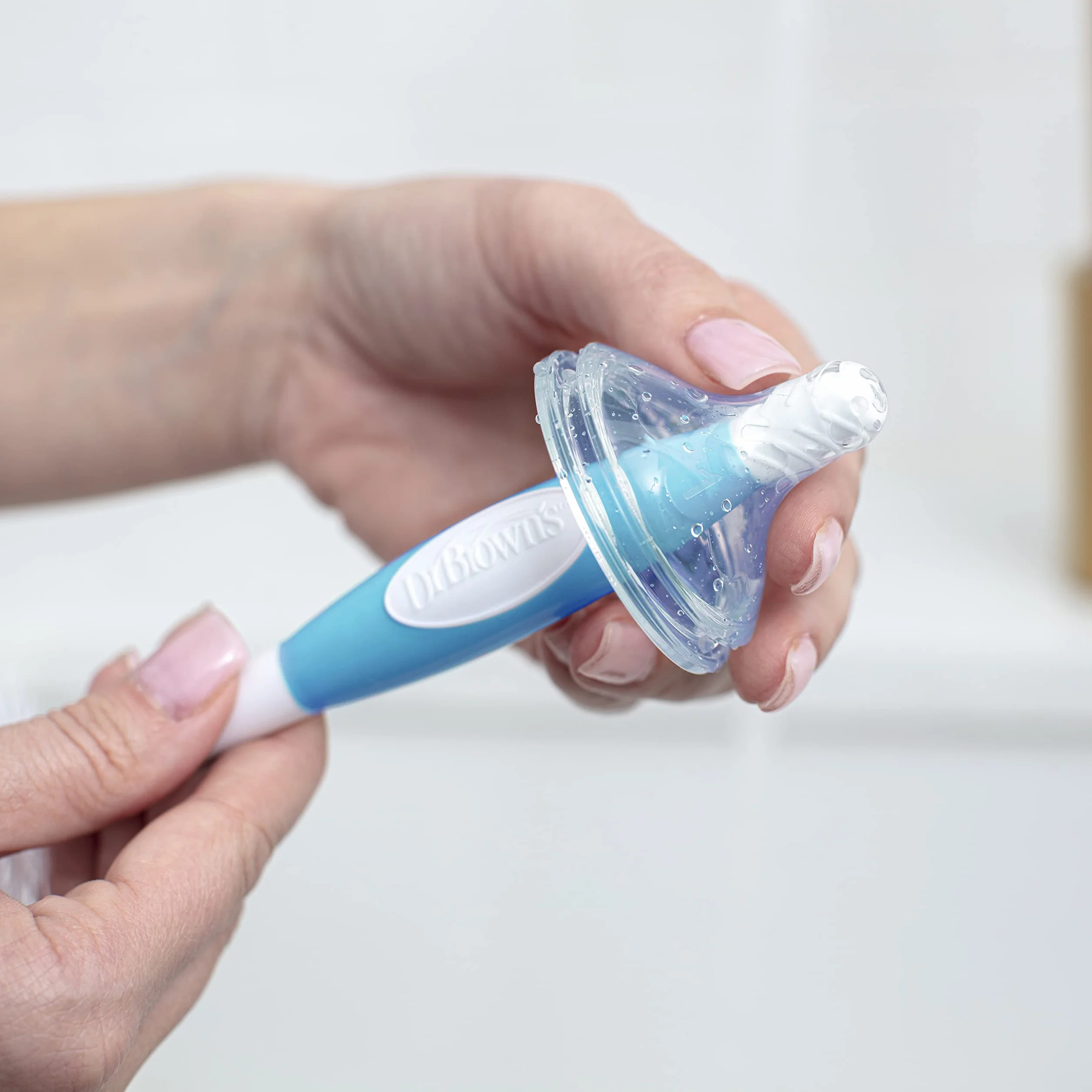Dr. Brown's Reusable Sponge Baby Bottle Cleaning Brush with Suction Cup Stand, Scrubber and Nipple Cleaner, Assorted Color 1-Pack