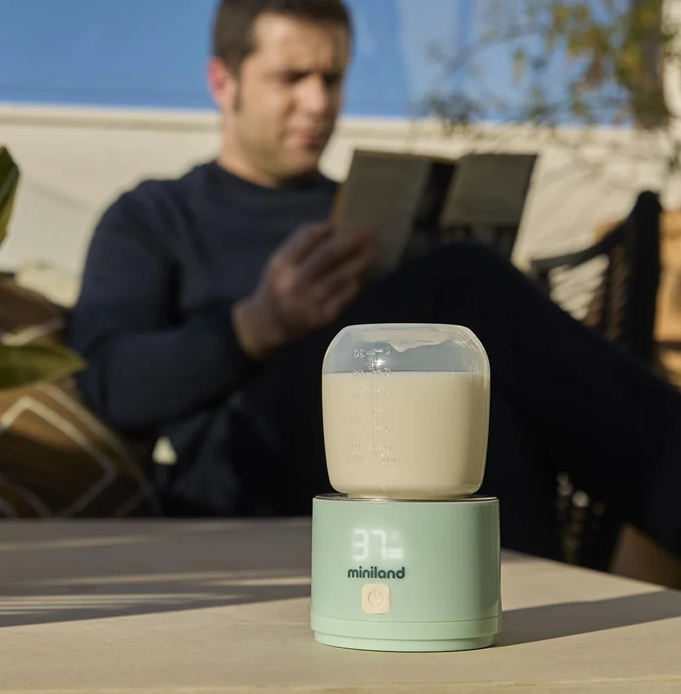 Miniland Scaldabagno portatile, leggero e compatto, con adattatori per biberon e cavo di ricarica, ideale per viaggi e passeggiate, accessori di alimentazione | Warmy On the Go