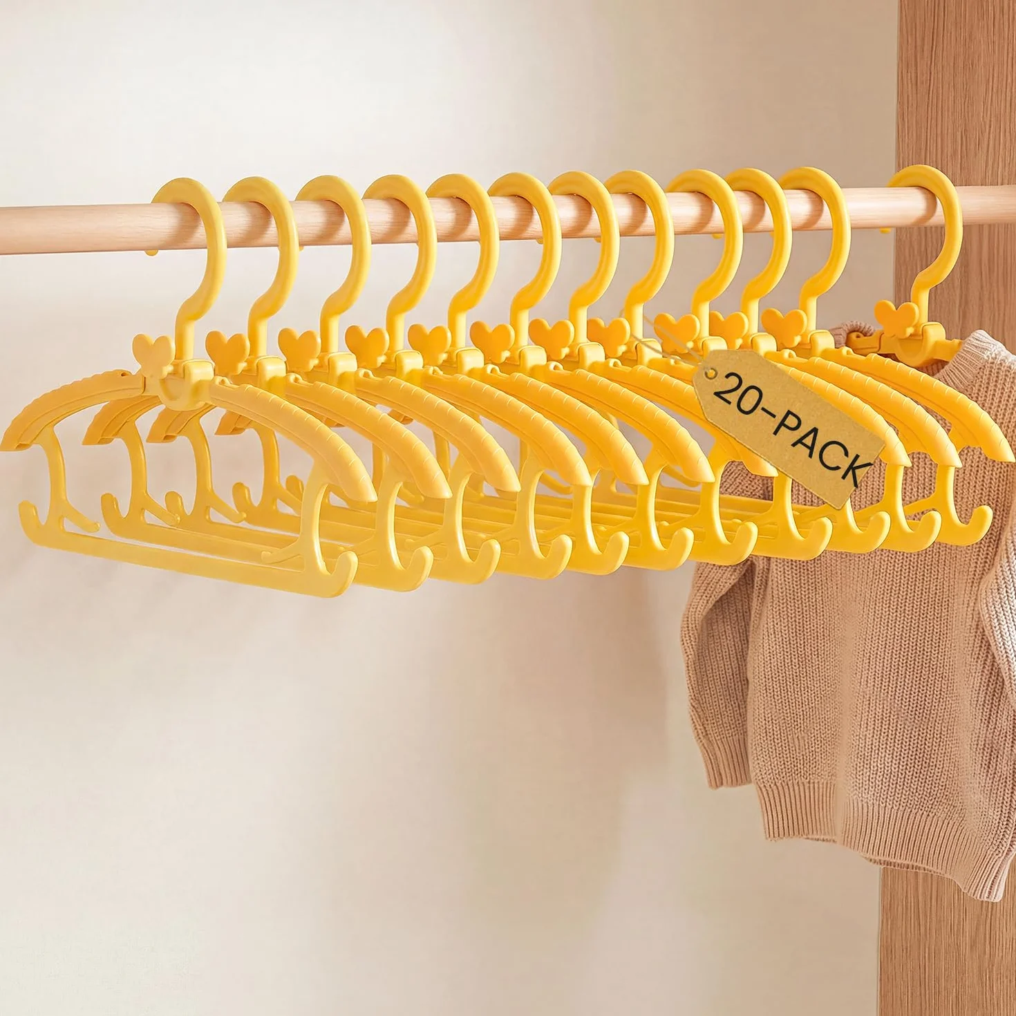 Damita Grucce appendiabiti per Neonato e Bambini – Ganci in Plastica Regolabili da 28 a 39 cm, Antiscivolo e Salvaspazio per Cameretta, con Ganci a farfalla – Giallo Sole (Confezione da 20 pezzi)