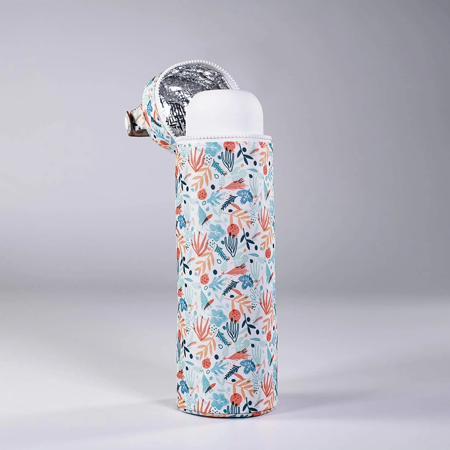 Miniland Thermibag 350 ml. Custodia isotermica con manico per appenderla e trasportarla facilmente. Ideale per biberon o termos. Collezione Mediterranean.